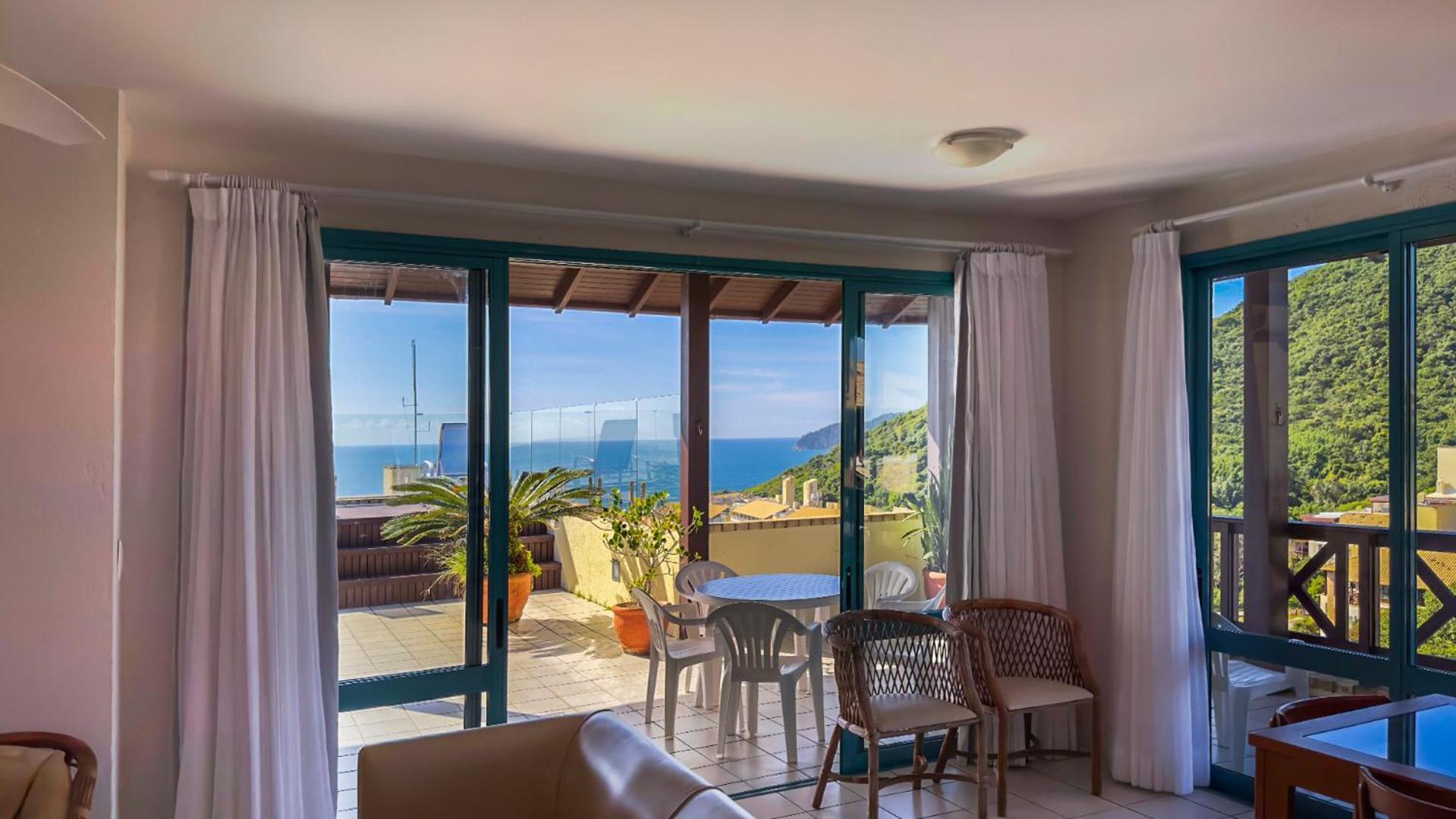 Costao Do Santinho Resort All Inclusive Florianopolis Room photo A view of the ocean from a villa at the resort